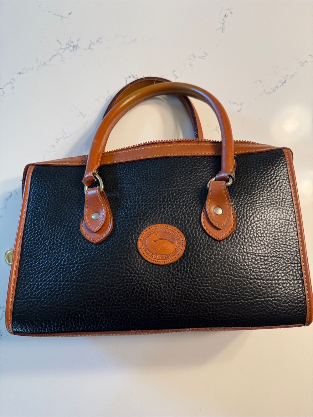 Dooney & Bourke Black Satchel with Brown Trim and Handles